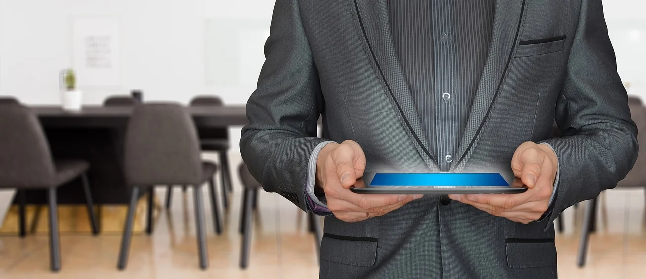 A customer success team discusses strategies in a meeting room