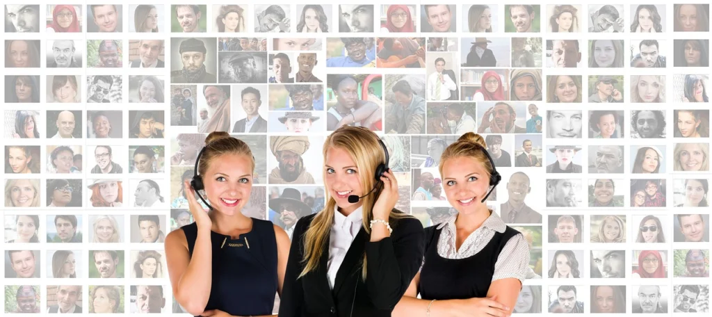 Customer support representative actively listening on headset while taking notes